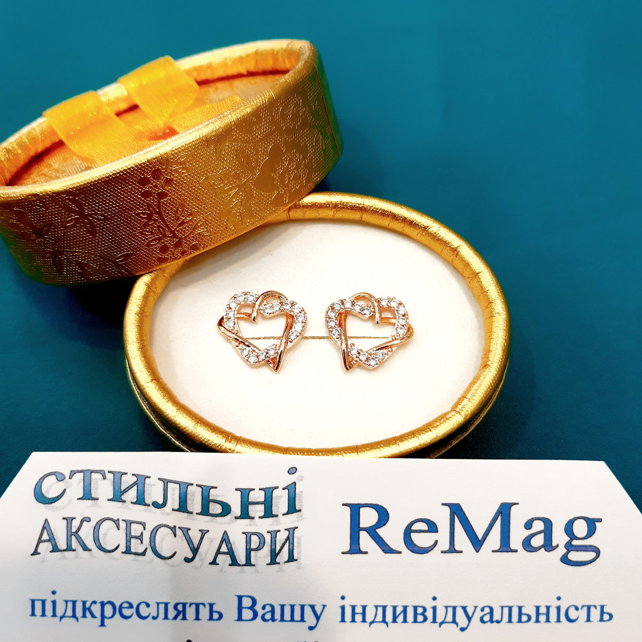 Женские серьги "Переплетение двух сердец" медзолото и цирконы в коробочке - оригинальный подарок девушке
Женские серьги "Переплетение двух сердец" медзолото и цирконы в коробочке - оригинальный подарок девушке