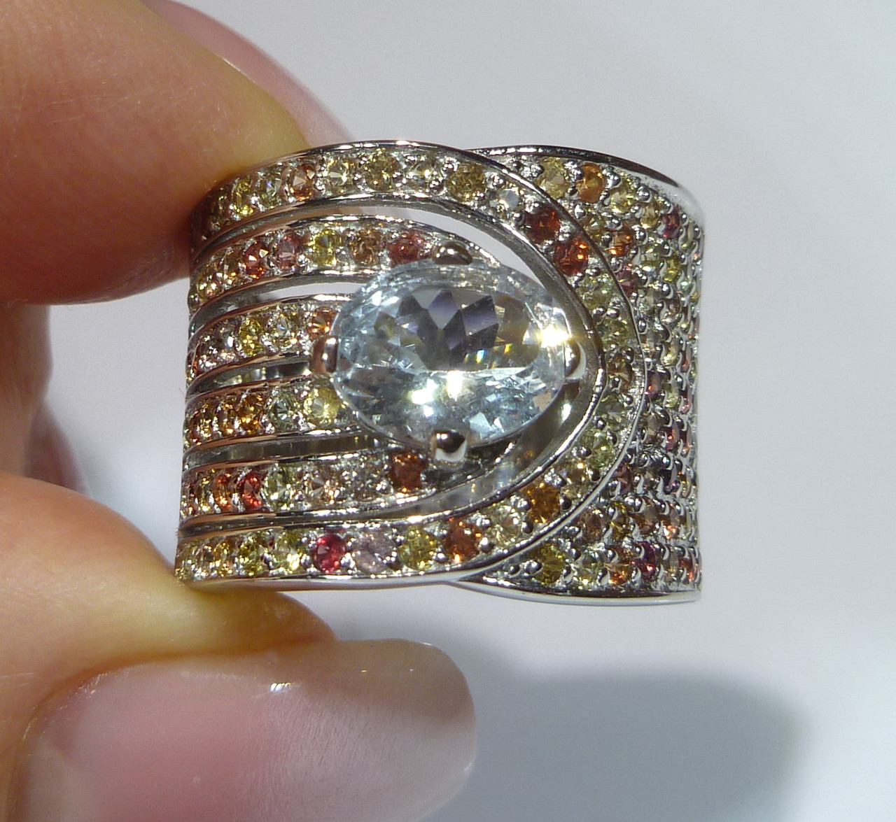 Широкое кольцо с натуральным бразильским аквамарином (берилл) 1.84 ct и сапфирами Сонгеа Размер 19
Широкое кольцо с натуральным бразильским аквамарином (берилл) 1.84 ct и сапфирами Сонгеа Размер 19