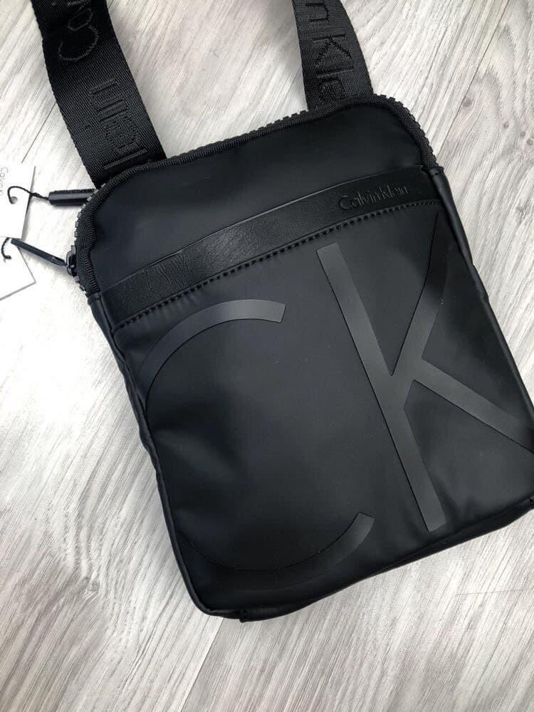 Мужская сумка мессенджер Calvin Klein черного цвета. Стильная мужская черная сумка мессенджер CK., Черный
Мужская сумка мессенджер Calvin Klein черного цвета. Стильная мужская черная сумка мессенджер CK., Черный