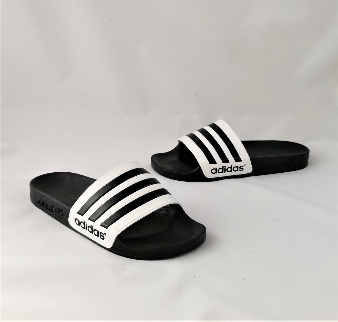 Мужские Шлёпанцы Тапочки ADIDAS Сланцы Адидас Чёрные с Белым (размеры: 40,41,42,45,46)
Мужские Шлёпанцы Тапочки ADIDAS Сланцы Адидас Чёрные с Белым (размеры: 40,41,42,45,46)