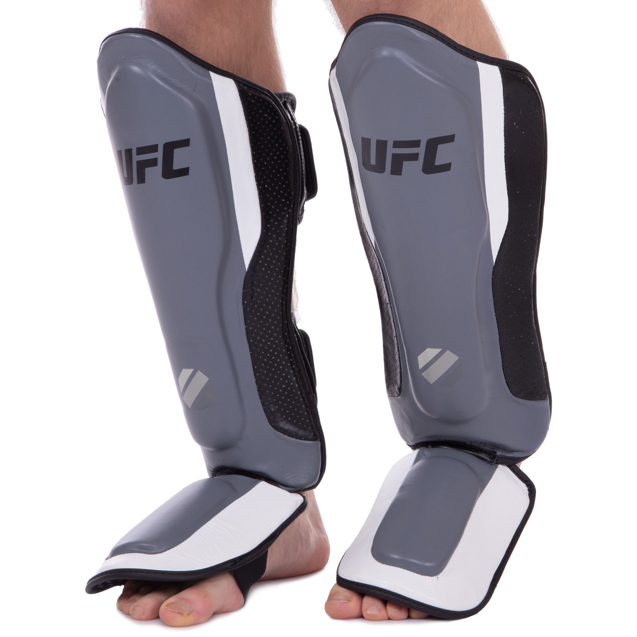 Защита для голени и стопы Муай Тай, ММА, Кикбоксинг кожаная UFC PRO Training UHK-69981 (р-р S-M,
Защита для голени и стопы Муай Тай, ММА, Кикбоксинг кожаная UFC PRO Training UHK-69981 (р-р S-M,