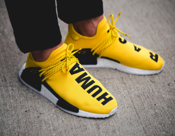 yellow human race adidas