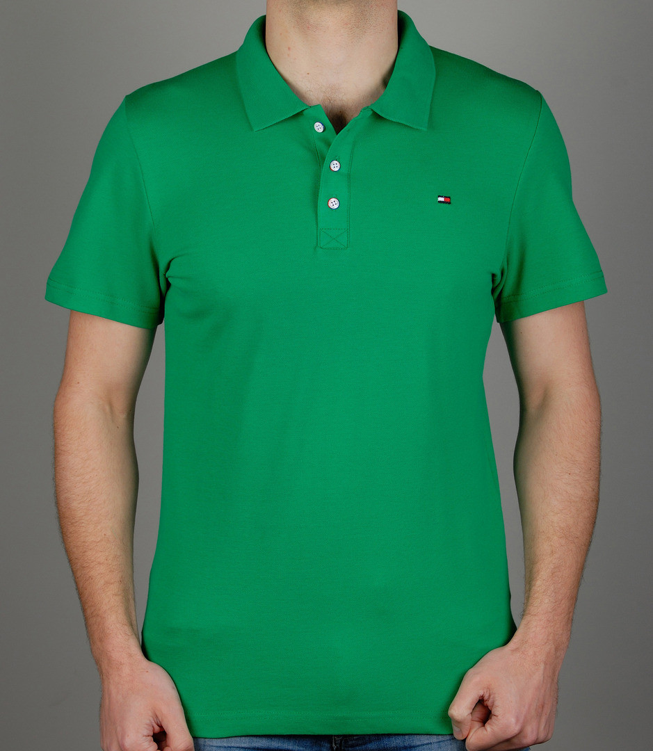Зеленые мужские поло. Поло лакост зеленое. Томми Хилфигер футболка поло зеленая. Поло зеленое лакоста мужские. Поло Томми Хилфигер темно зеленое.