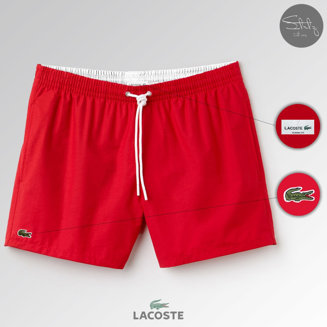 

Яркие красные шорты для пляжа Lacoste