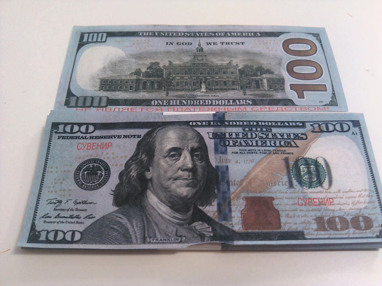 Фото нового доллара 100. 100 Долларов купюра. Новые 100 долларовые купюры. СТО долларов купюра. Оригинальная купюра 100 долларов.
