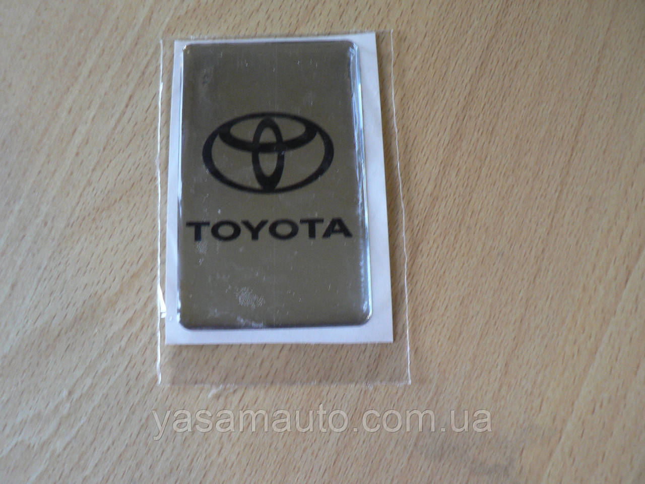 

Наклейка s надпись Toyota 50х80х1мм хром силиконовая полоска на авто эмблема Тойота медальон