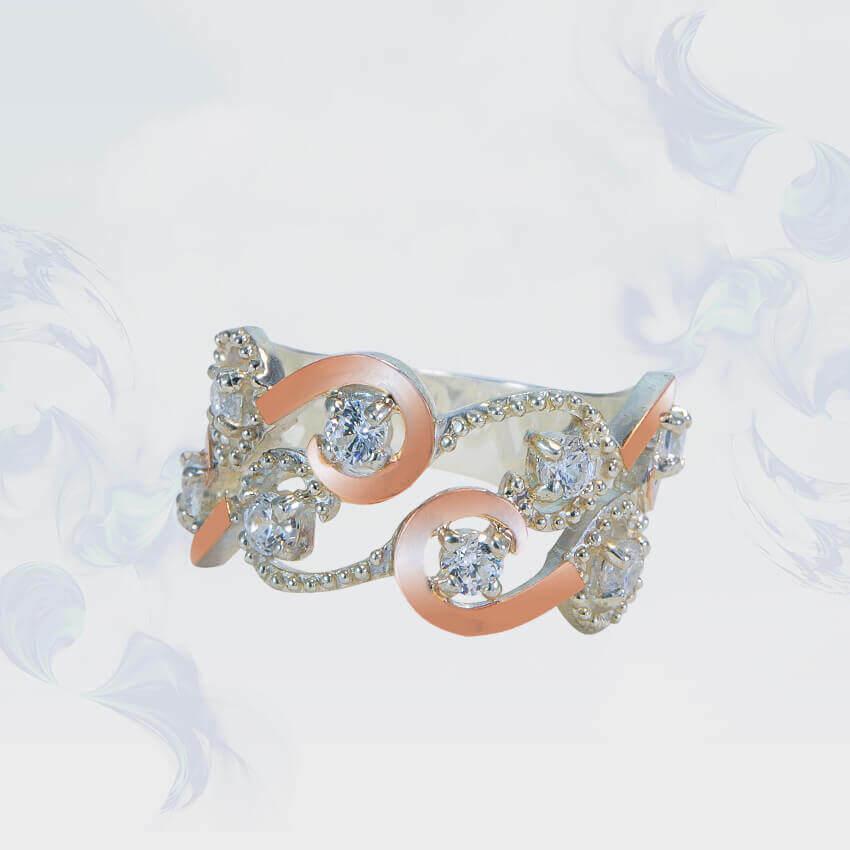 

Кольцо из серебра с золотыми вставками, модель 125