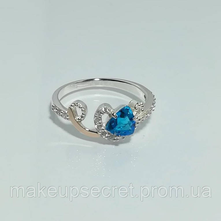 

Серебряное кольцо с золотыми накладками арт.103 голубой