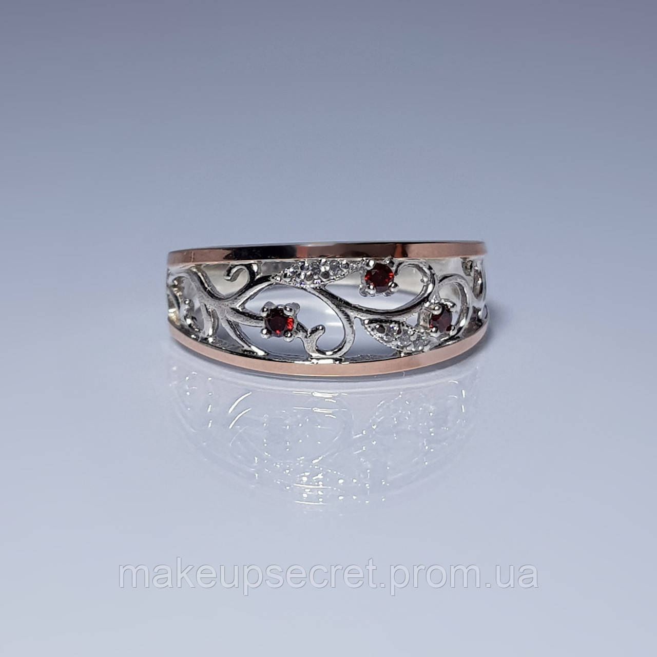 

Серебряное кольцо с золотыми накладками арт.121 красный