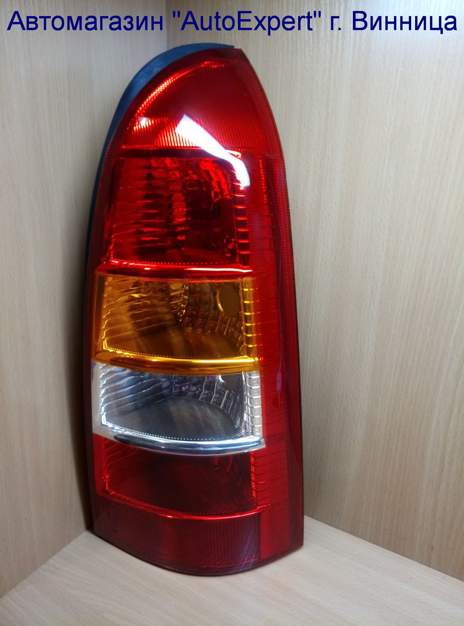 

Фонарь задний правый красно-желтый-белый OPEL ASTRA G 98-09
