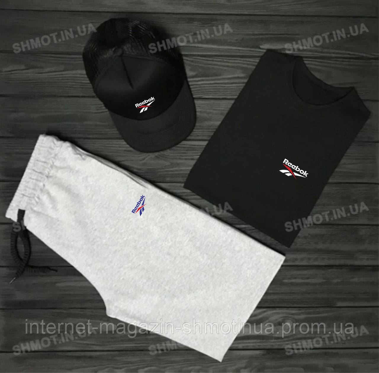 

Мужской комплект футболка кепка и шорты Reebok черного и серого цвета (копия)