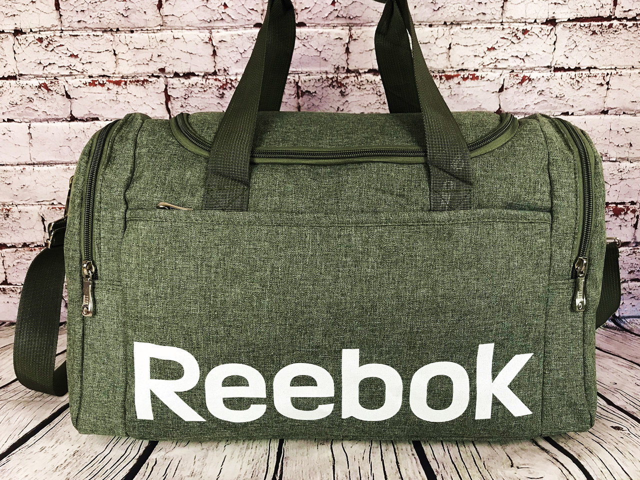 

Небольшая спортивная сумка Reebok. Дорожная сумка. Раз. 42*25*21см КСС15-1