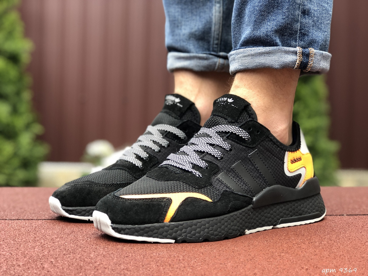 

Кросівки чоловічі Adidas Nite Jogger Boost чорні з помаранчевим 45, Черный