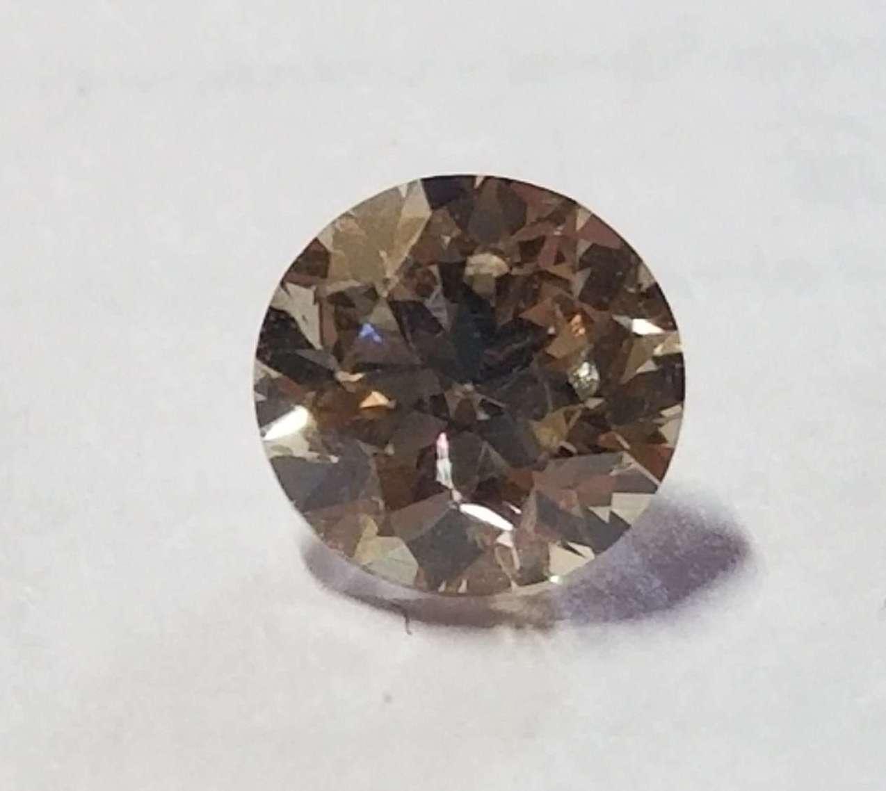 Діамант природний 0.52 Carat Fancy Brown VVS2 4.99 mm