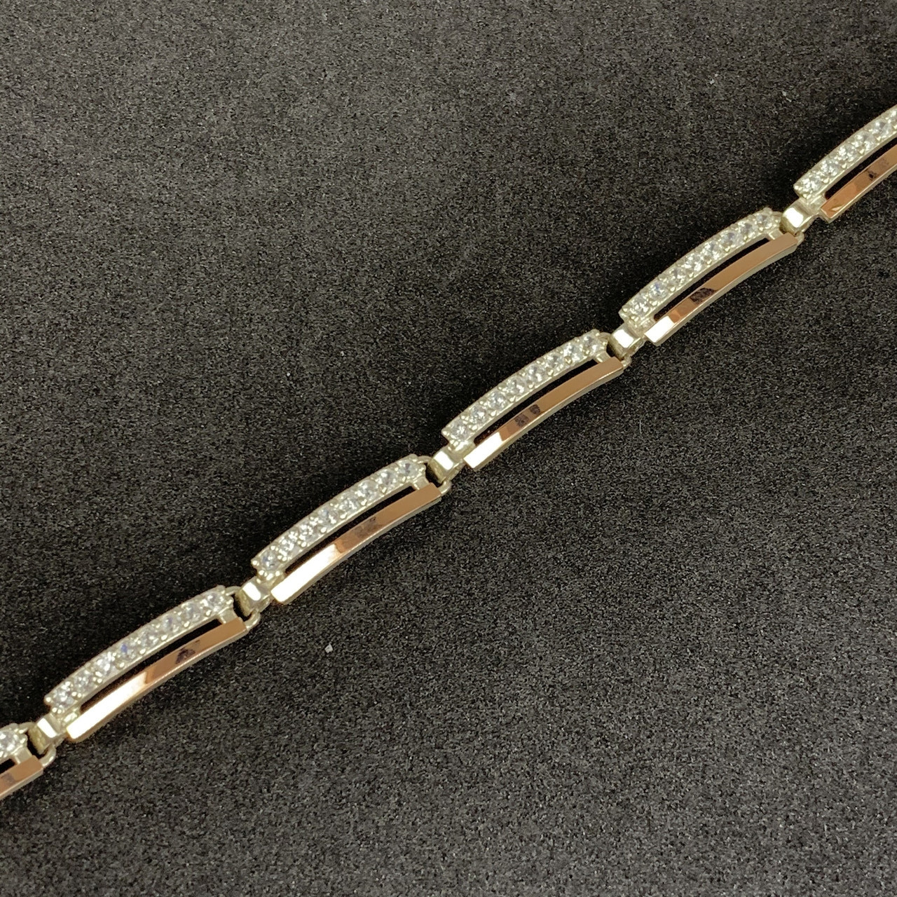 Шикарный женский серебряный браслет с золотыми вставками (пластинами) "Ультра" с фианитами