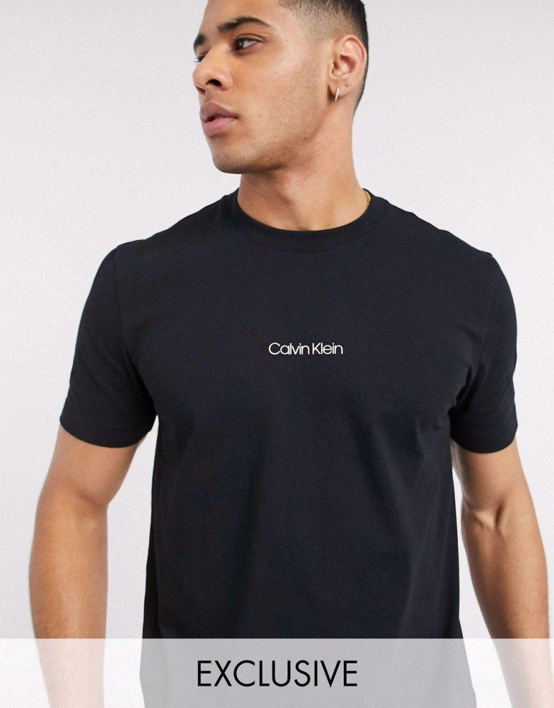 

Футболка Calvin Klein чёрная с белым мелким лого