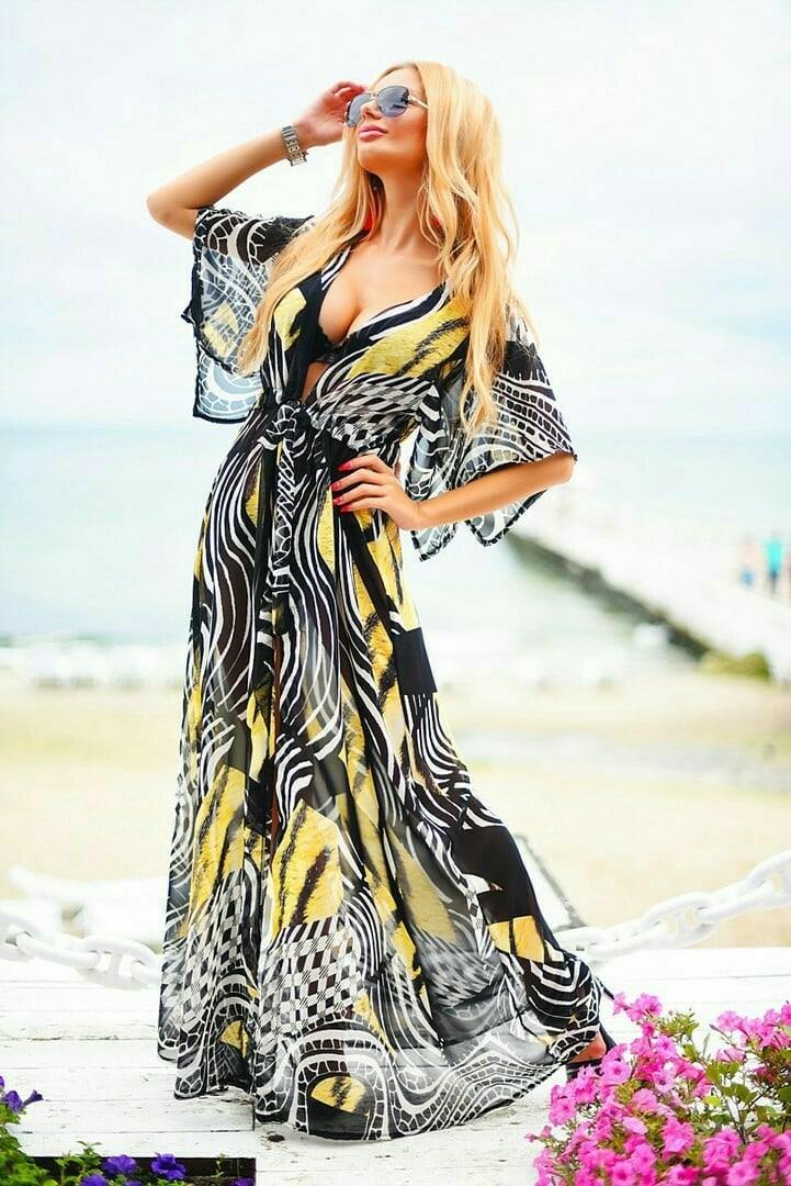 

Женская длинная пляжная накидка из шифона с принтами. Расцветки в ассортименте