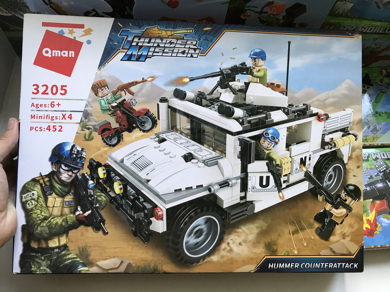 

Конструктор Brick 3205, Qman Хамер Hummer, боевой джип 4 фигурки, 452 детали в коробке 41*6,5*30, Разные цвета