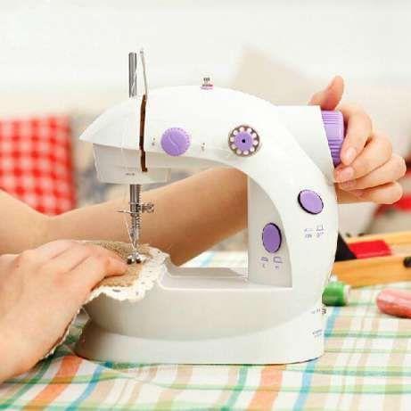 

Швейная машинка портативная Mini Sewing Machine FHSM 201 с адаптером фиолетовая! Лучшая цена