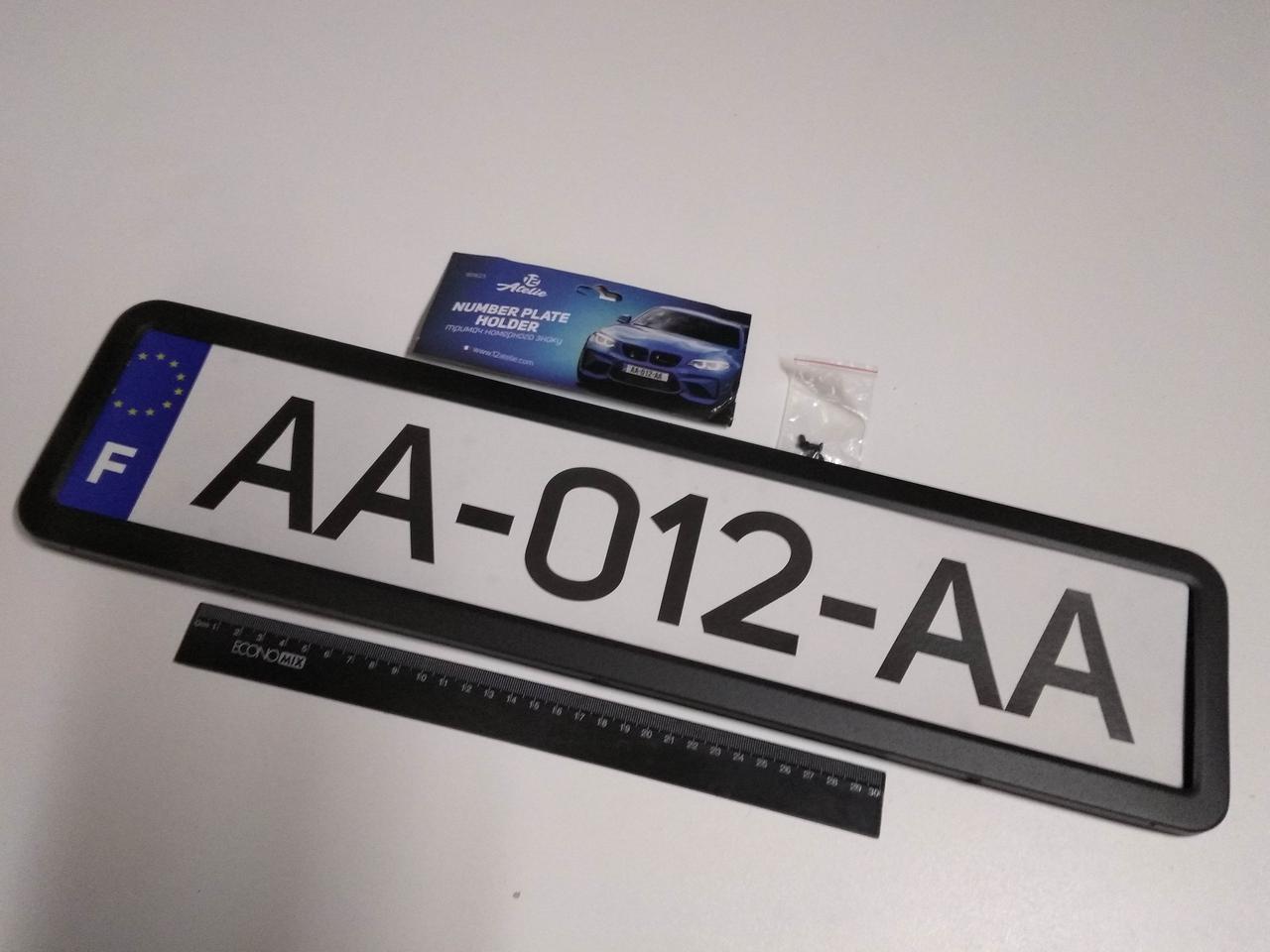 Рамка номерного знака (1 шт.) 12 Atelie (951623) металлическая/черный 