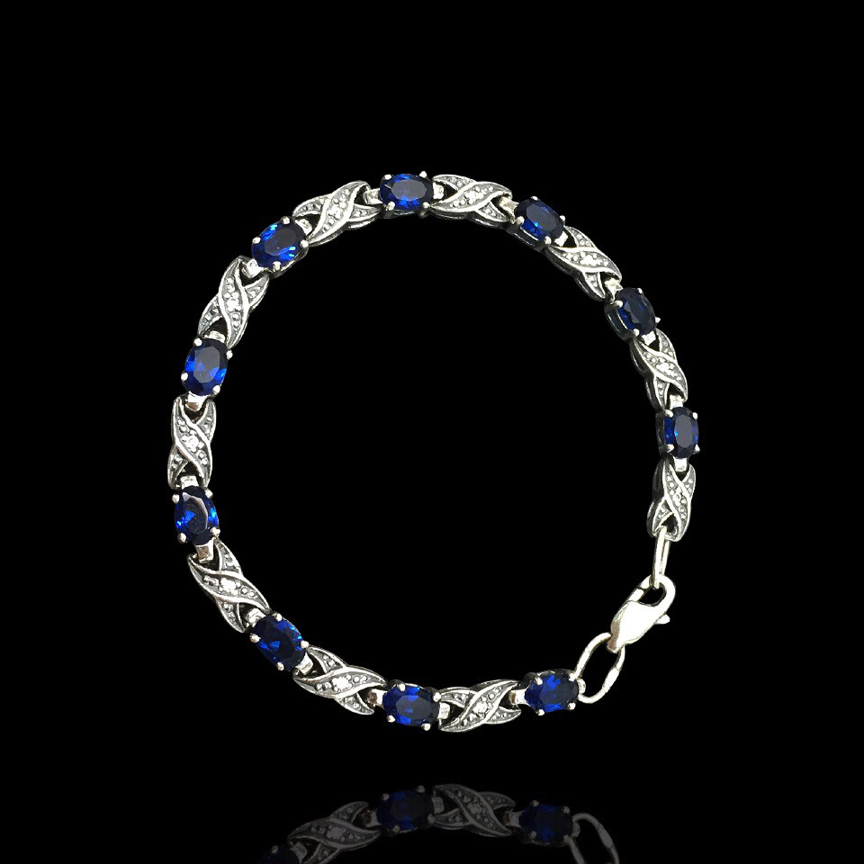 Срібний жіночий браслет з синіми фіанітами, 185мм