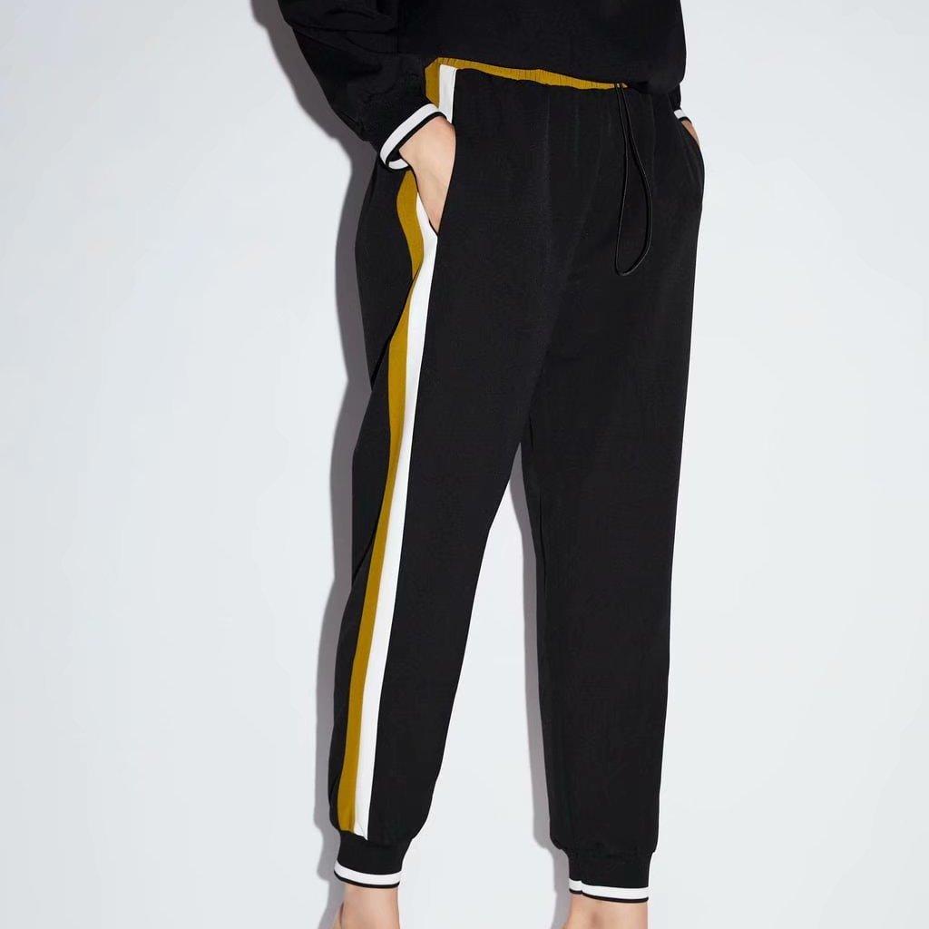 

Брюки-джоггери жіночі з контрастними лампасами і манжетом Casual Berni Fashion (L)