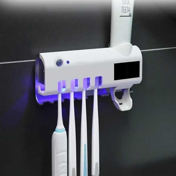 

Диспенсер для зубной пасты и щеток автоматический Toothbrush sterilizer