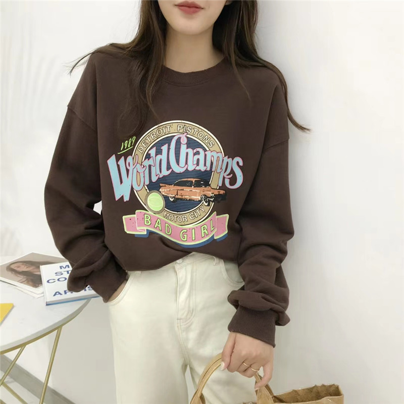 

Свитшот женский World Chams, коричневый Berni Fashion