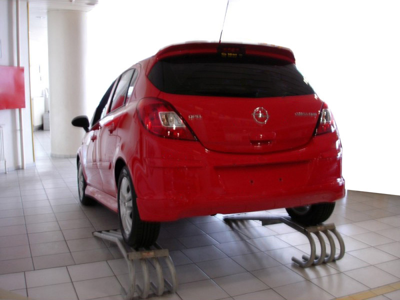 

Задняя нижняя юбка (под покраску) Opel Corsa D 2007↗ гг. / Тюнинг заднего бампера Опель Корса