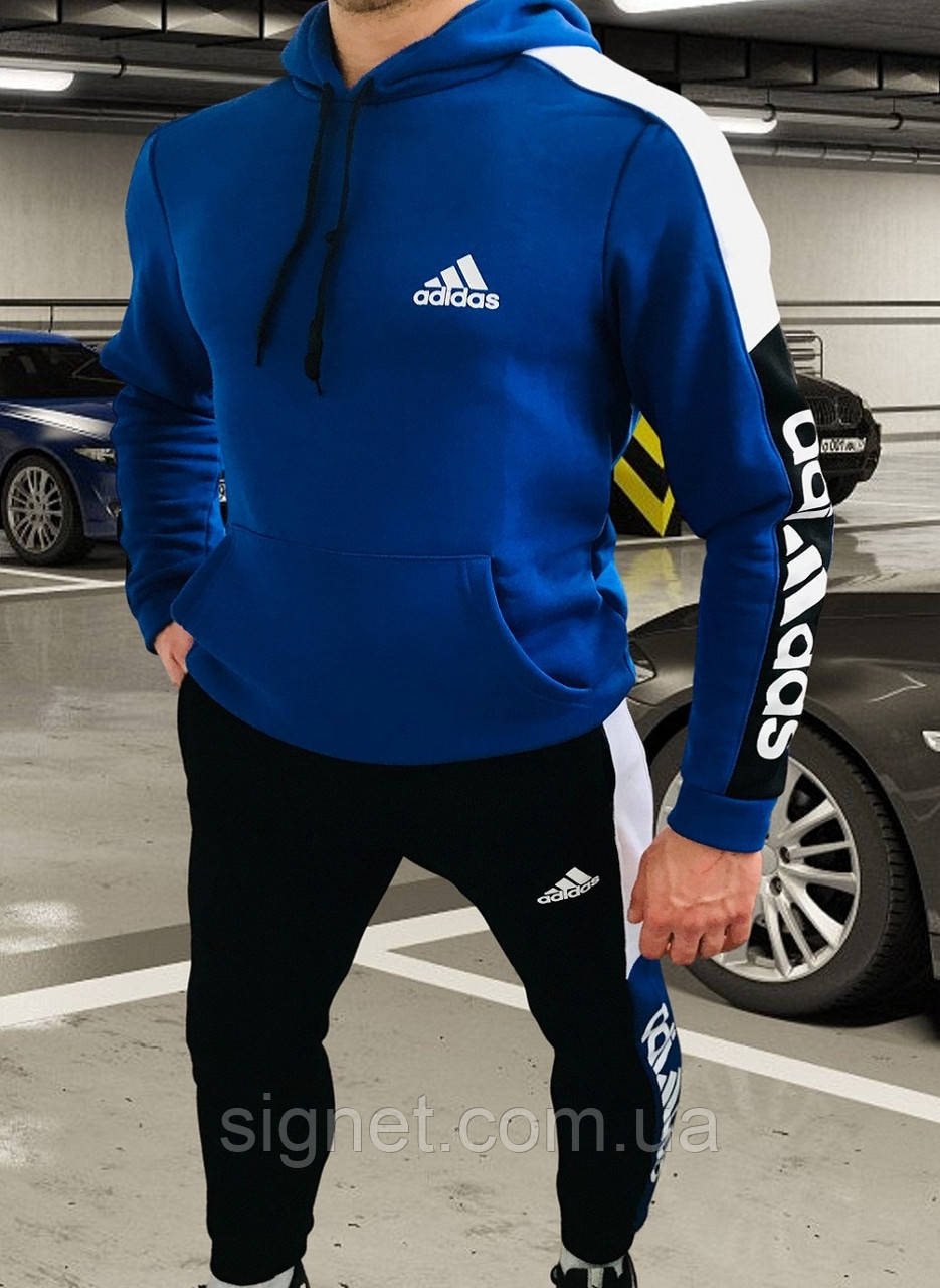 

Мужской спортивный костюм Adidas(адидас). Синий утепленный мужской спортивный костюм Adidas(адидас).