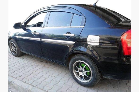 

Наружняя окантовка стекол (4 шт, нерж) OmsaLine - Итальянская нержавейка - Hyundai Accent 2006-2010 гг.