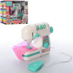 Детская игрушечная швейная машинка 7923 шьет, на батарейках, 18 см