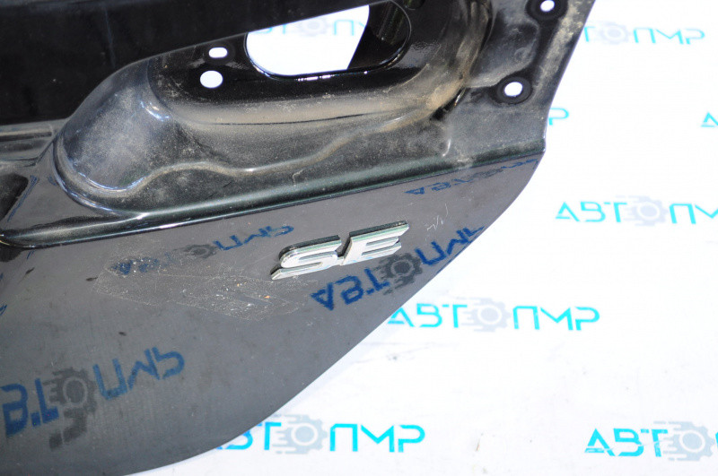 

Эмблема SE крышки багажника Toyota Camry v50 12-14 usa 75443-06200 Тойота Камри