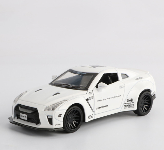 

Игрушечная машина Nissan GTR 7862 металлическая со звуковыми эффектами (Белый)