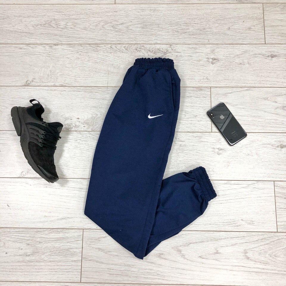 

Спортивные штаны Nike на манжете Найк приталенные тёмно-синие унисекс мужские/женские
