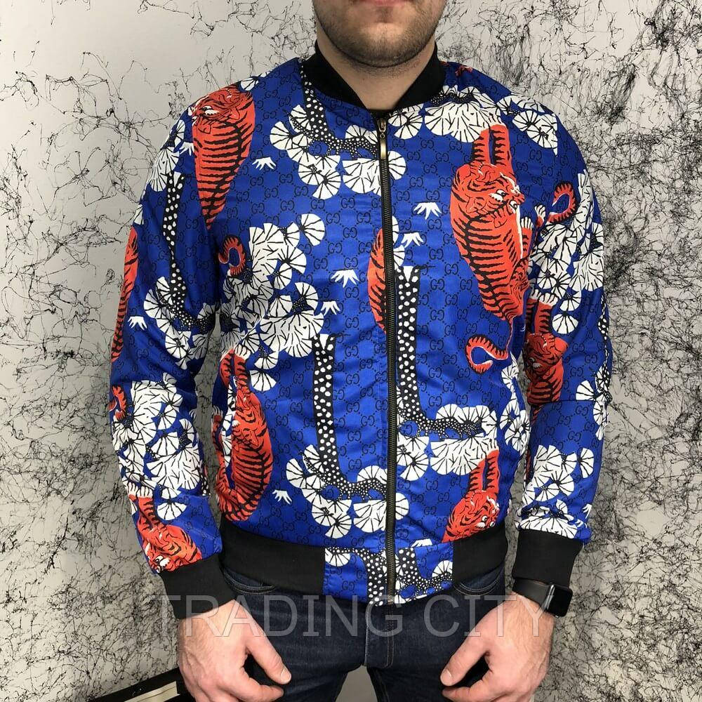 

Gucci Flora Tiger Print Silk Bomber Jacket Blue