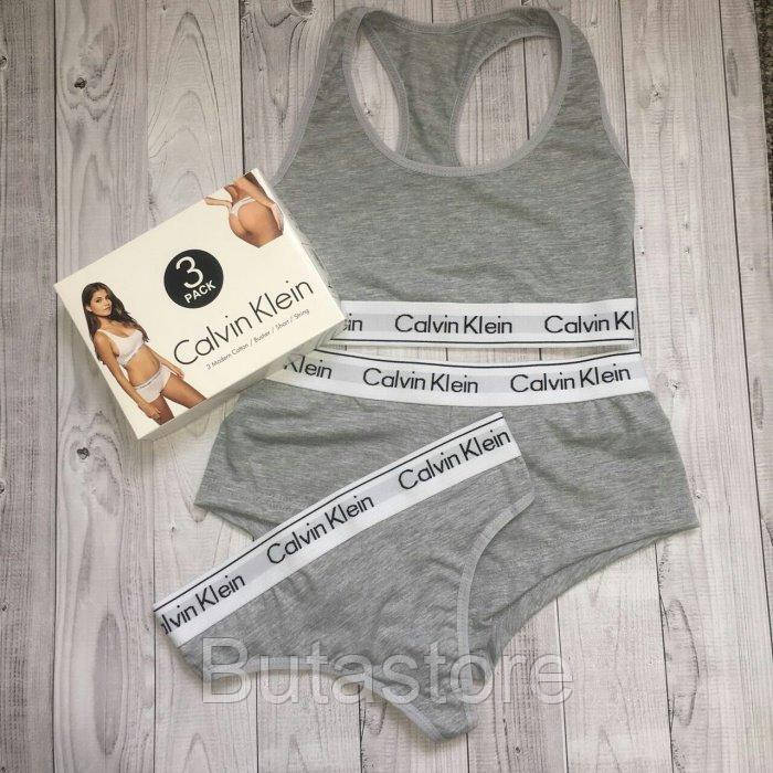 

Набор женский Calvin Klein 3 в 1 тройка (стринги + топ + шорты) СЕРЫЙ / женские стринги