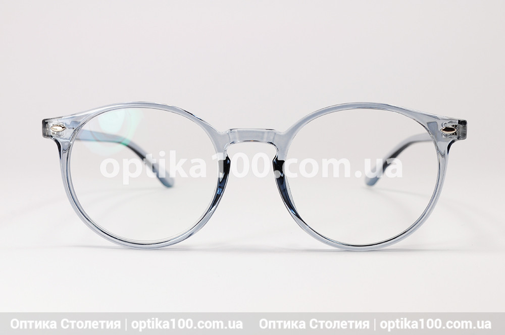 Кругла оправа для окулярів TR-90. Легка та гнучка з напівпрозорого пластику. На середнє і невелике обличчя