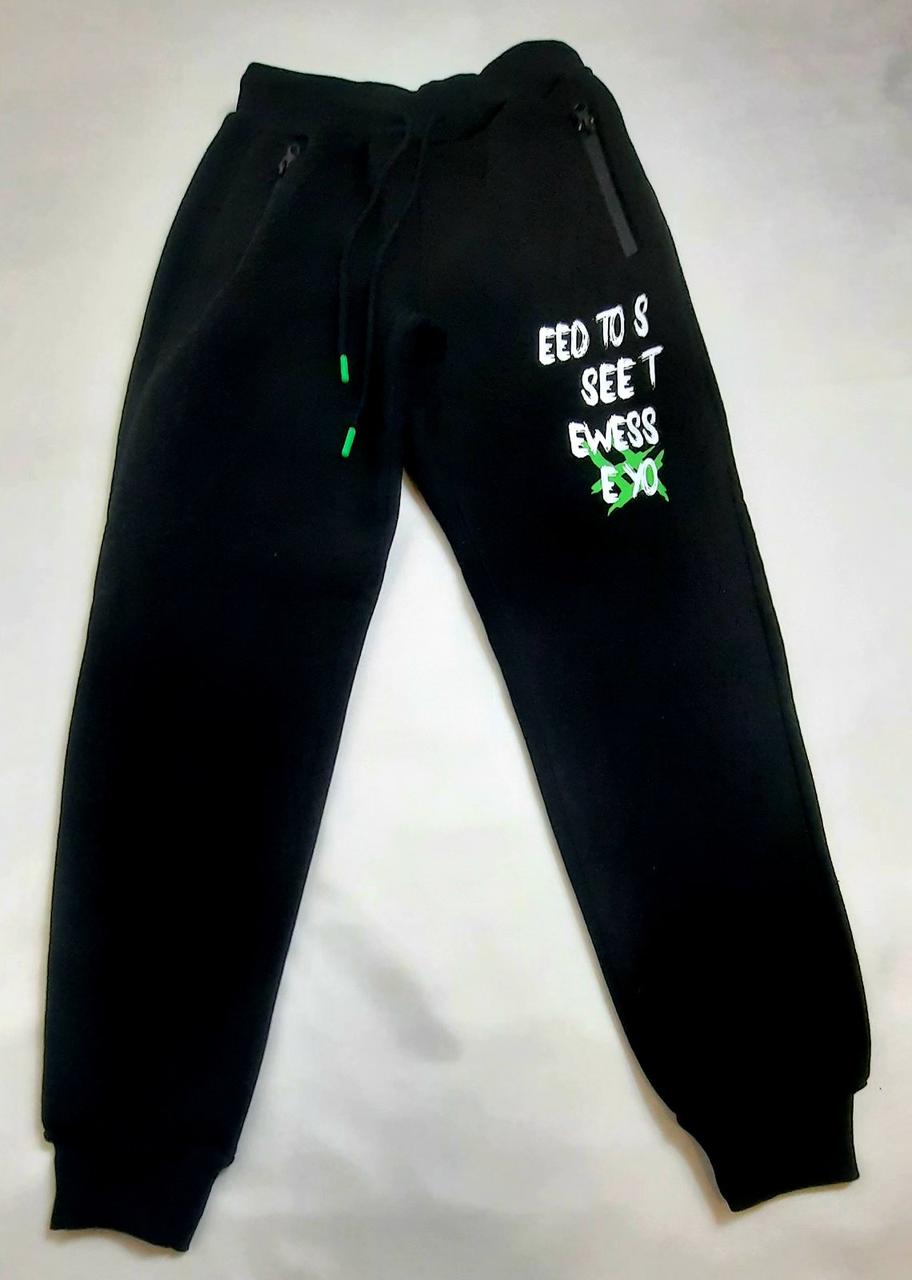 

Спортивные штаны трикотажные на флисе для мальчика BOLD Турция чёрные с надписями зауженные на манжетах