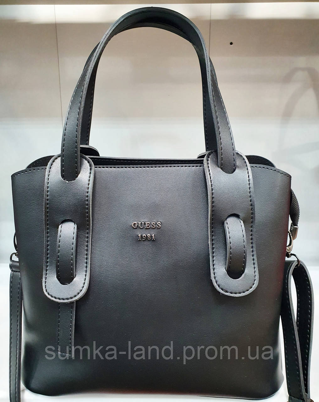 Женская черная сумка Dior из турецкой эко-кожи с карманами на магнитах по бокам 28*23 см