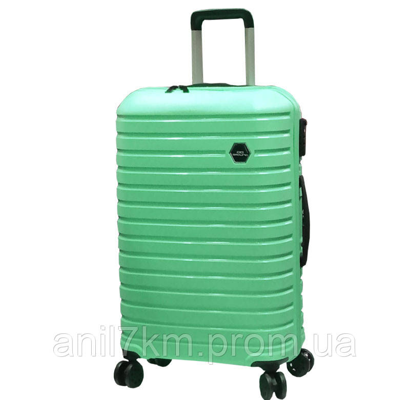 Пластиковий чемодан на чотирьох гумових колесах, обертаються на 360° хорошої якості. поліпропілен