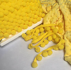 Тасьма з помпонами жовтого кольору d 20 мм