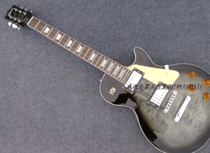 

Электрогитара Gibson Les Paul Standard Silver Sunburst China, Серый